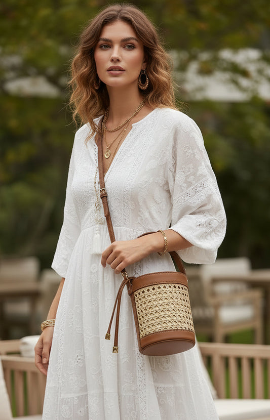 Sac Kelly marron paille et cuir porté, style élégant intemporel